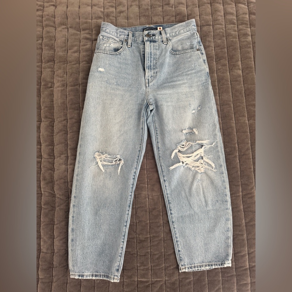 Levi’s distressed barrel jeans